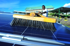 Silandoi Matikoi caretaker of Talek Solar Power Plant in Narok County, Kenya cleans the solar panels used to supply power to the residents of Talek town. Constructed with the help of the German government, the power plant will supply clean green power to the residents of Talek who are not connected to the National power grid