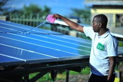 Silandoi Matikoi caretaker of Talek Solar Power Plant in Narok County, Kenya cleans the solar panels used to supply power to the residents of Talek town. Constructed with the help of the German government, the power plant will supply clean green power to the residents of Talek who are not connected to the National power grid