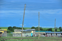 Complete power lines along domestic residences in Talek town. Through Talek Power, GIZ and other partners have constructed a solar power grid which will connect residents of Talek town in Narok to power for domestic and commercial use.